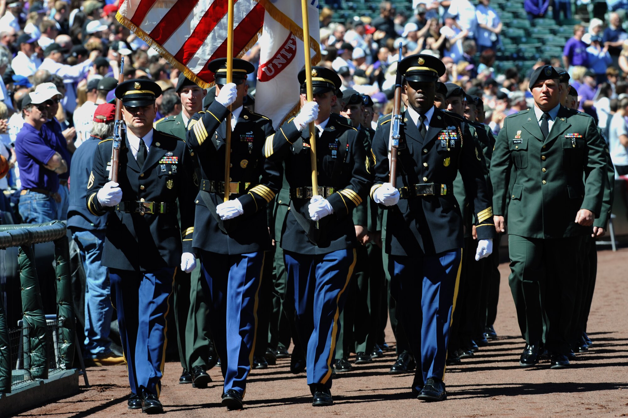 DENVER, Colo. -- Soldiers from Colorado recruiting stations and Fort Carson display the colors during the Colorado Rockies Opening Day festivities April 9 at Coors Field. (U.S. Air Force photo by Airman 1st Class Marcy Glass)