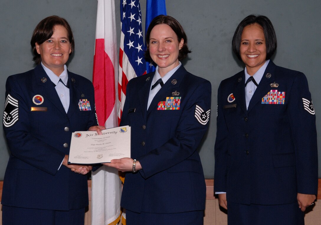TSgt Paula Goetz receives her NCO Academy graduation certificate.