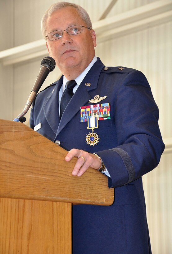 Brig. Gen. James L. Melin speaks to the members of the 452nd Air Mobility Wing before giving command of the wing to Col. Karl McGregor March 27. (U.S. Air Force photo by Senior Airman Patrick Cabellon)