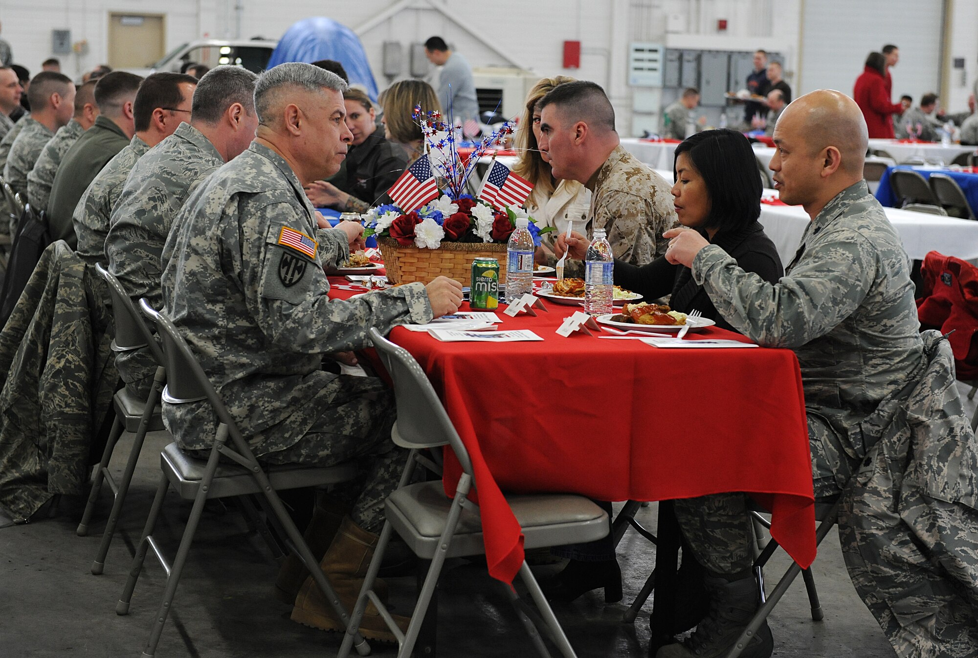 ELMENDORF AIR FORCE BASE, Alaska -- Air Force, Army and Marines gather at hangar 5 for the first Joint Base Elmendorf-Richardson National Prayer Luncheon April 16. Chaplain (Maj. Gen.) Cecil Richardson spoke to hundreds of servicemembers about the power of prayer during the luncheon. Chaplain Richardson is the Air Force Chief of Chaplains. (Air Force photo by Senior Airman Cynthia Spalding)