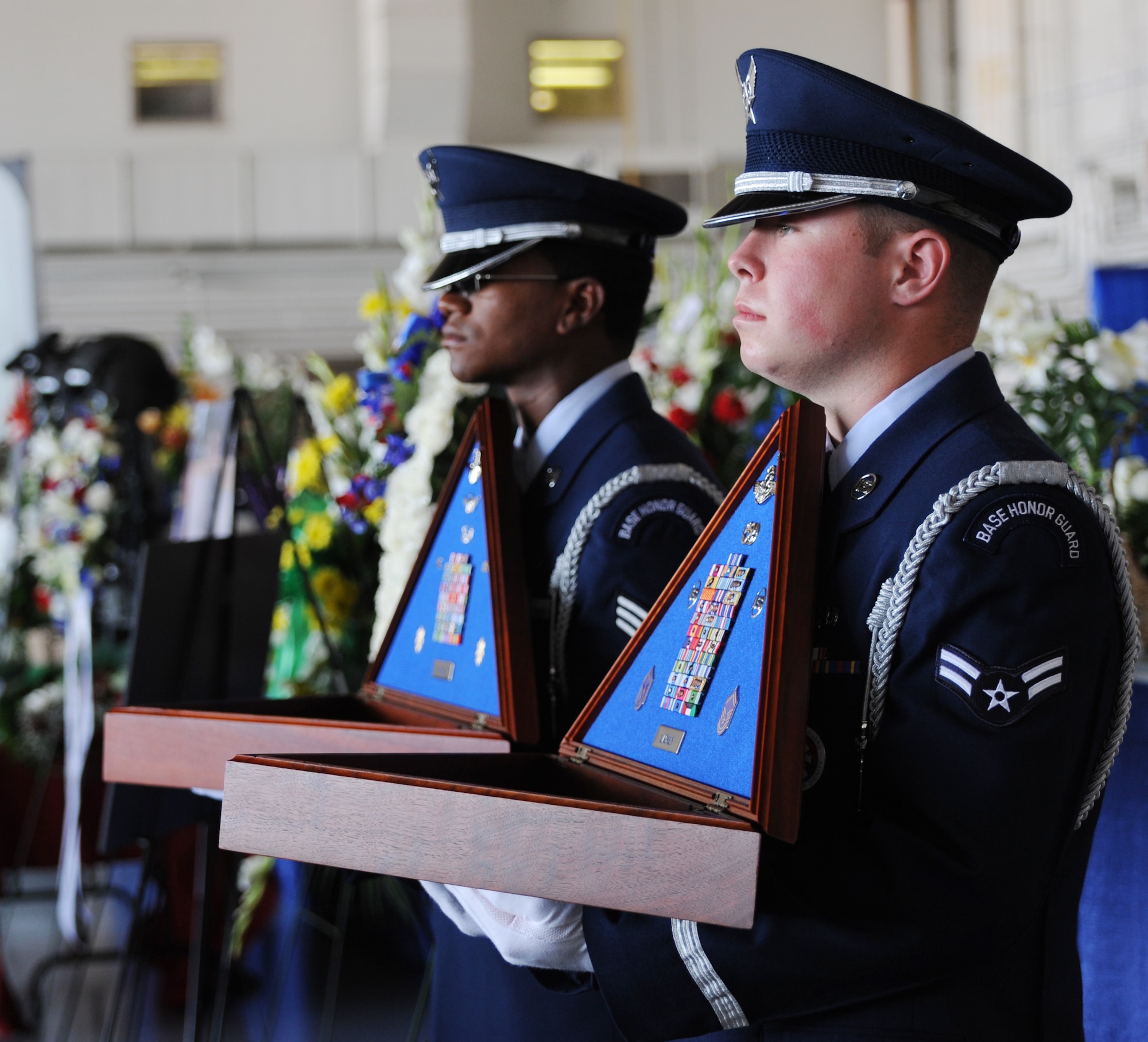 Members of the base honor guard at Hurlburt Field, Fla., hold shadow boxes that will be presented to the families of Maj. Randell Voas and Senior Master Sgt. James Lackey during a memorial service there April 15, 2010. Major Voas and Sergeant Lackey, assigned to the 8th Special Operations Squadron as an evaluator pilot and an evaluator flight engineer respectively, died in the line of duty when their CV-22 crashed in Afghanistan April 9. (U.S. Air Force photo/Airman Caitlin O'neil-McKeown)
