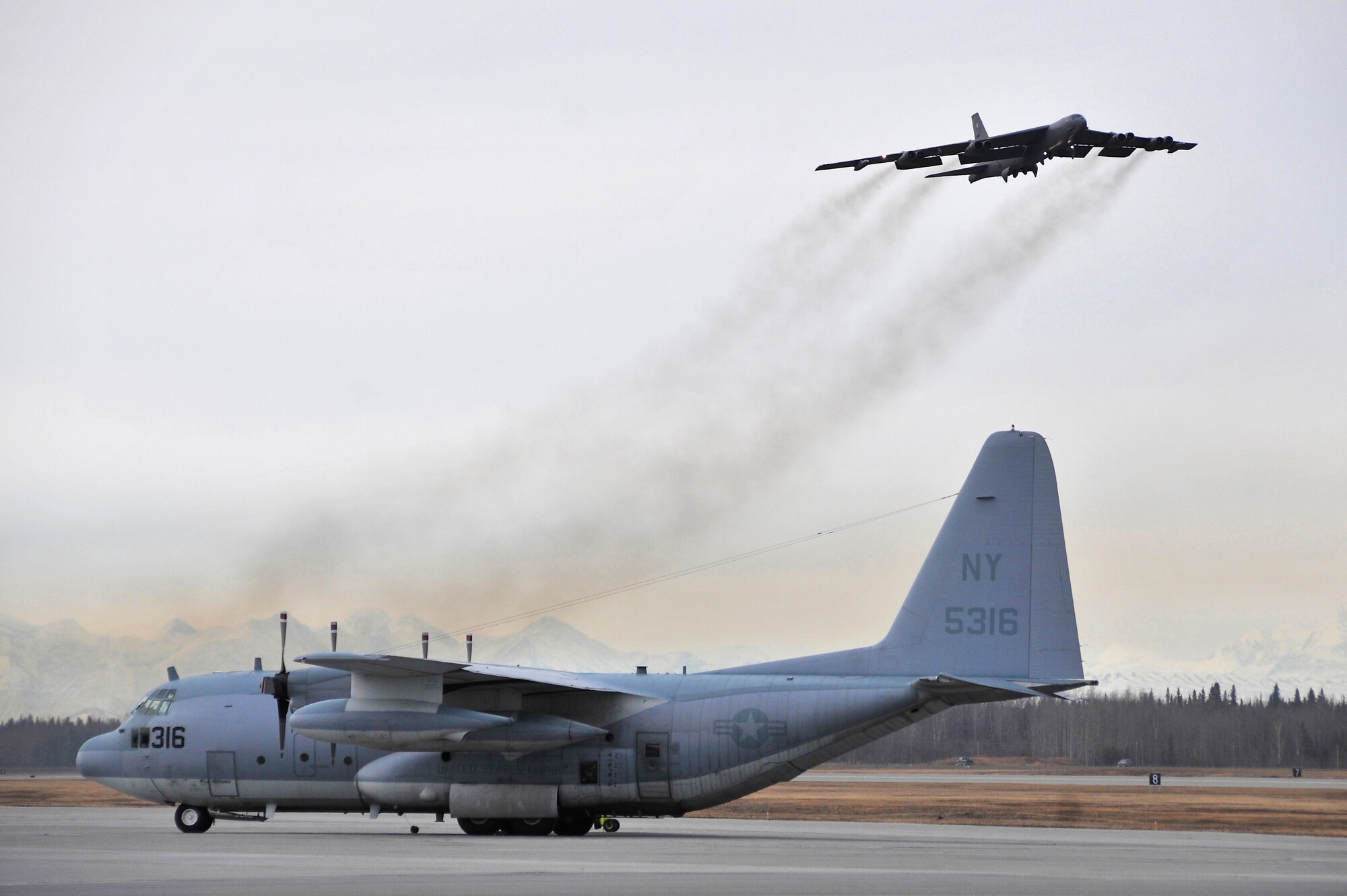 A B-52H Stratofortress launches from the runway during RED FLAG-Alaska 10-2, April 19, 2010, Eielson Air Force Base, Alaska. RF-A provides participants 67,000 square miles of airspace, more than 30 threat simulators, one conventional bombing range and two tactical bombing ranges containing more than 400 different types of targets. The B-52H is assigned to Barksdale AFB, Louisiana. (U.S. Air Force photo/Staff Sgt. Christopher Boitz)