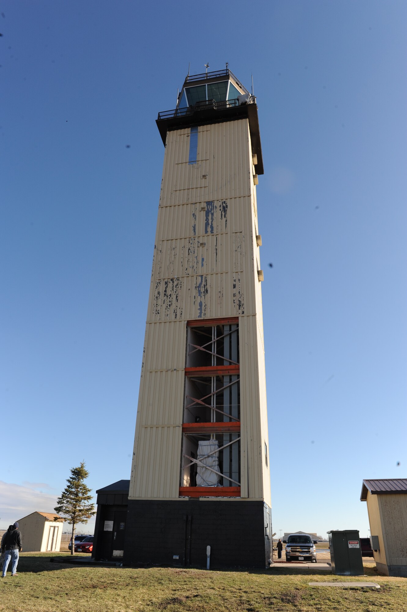 MINOT AIR FORCE BASE, N.D. -- The air traffic control tower at Minot Air Force Base was damaged by high winds April 14. The wind caused an estimated $20,000 in damage and required urgent repairs to protect electronic equipment inside.  Base operations were not affected. (U.S. Air Force photo by Staff Sgt. Keith Ballard)