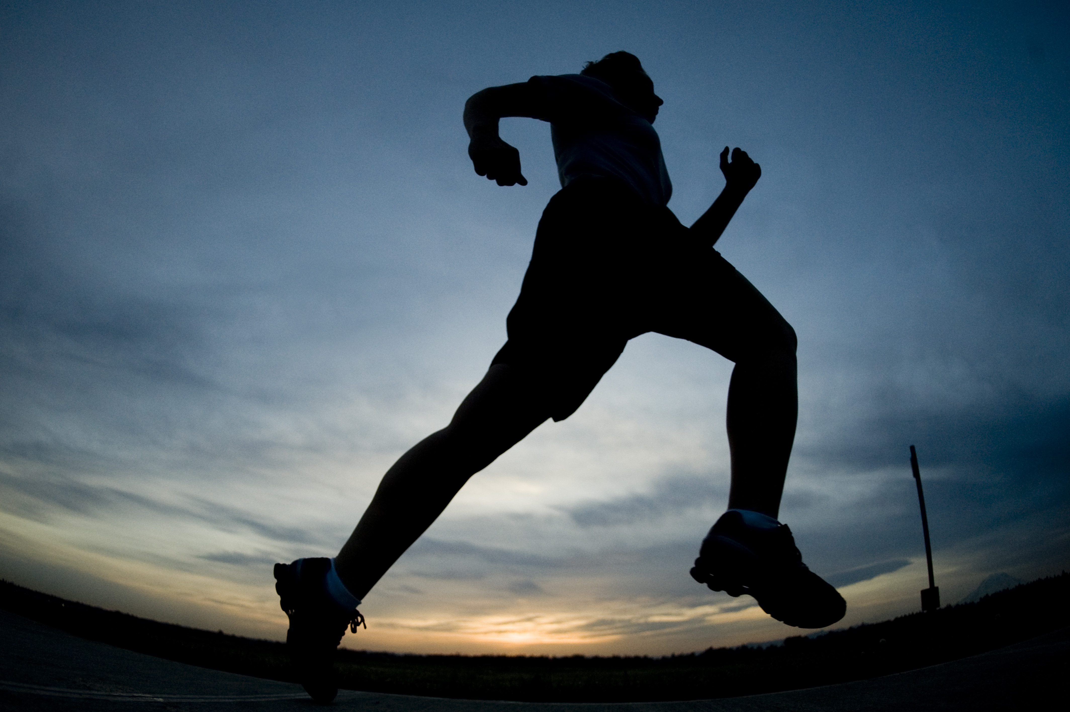 Man going for a run, one effective way to reduce coughing.