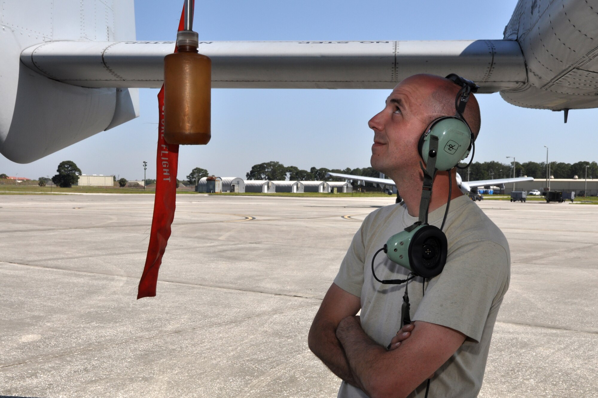 Tech. Sgt. Shannon Wright, propulsion technician, 717th Aircraft Maintenance Squadron, checks to make sure excess fuel from the engines of an A-10 Thunderbolt II jet aircraft drain properly after the engine shut down at MacDill Air Force Base, Fla., April 1, 2010. “It’s a critical item,” Sergeant Wright said. More than 100 Airmen from the 917th Wing, Barksdale Air Force Base, La., participated in Patriot Everglades, which supported the training of Joint Terminal Attack Controllers (JTAC) and Combat Search and Rescue (CSAR) operations. (U. S. Air Force Photo/Tech. Sgt. Jeff Walston)
