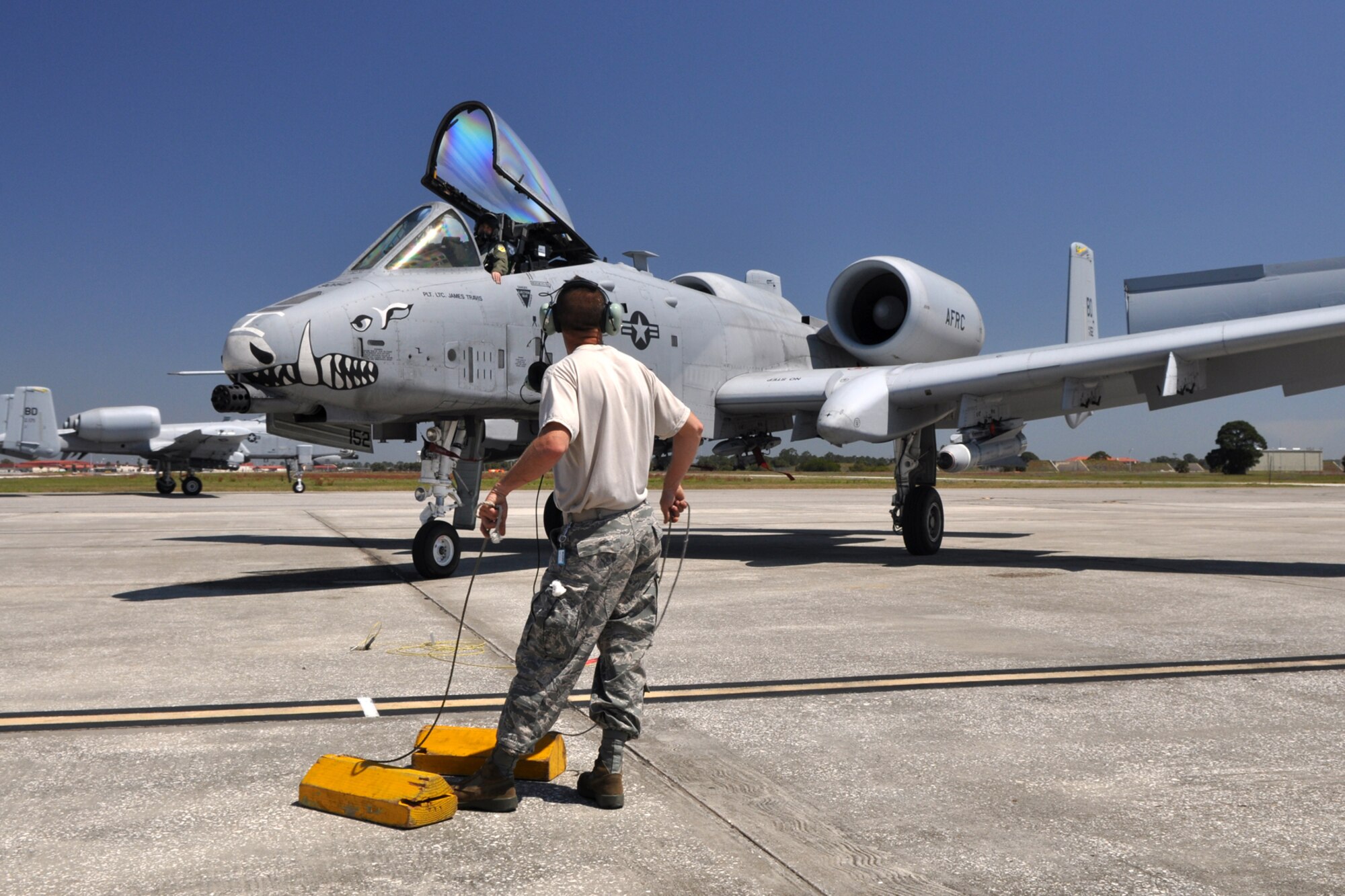 Tech. Sgt. Christopher Duhe, crew chief, 717th Aircraft Maintenance Squadron, prepares to recover an A-10 Thunderbolt II at MacDill Air Force Base, Fla., April 1, 2010. Sergeant Duhe was one of more than 100 Airmen from the 917th Wing, Barksdale Air Force Base, La., who participated in Patriot Everglades, which supported the training of Joint Terminal Attack Controllers (JTAC) and Combat Search and Rescue (CSAR) operations. (U. S. Air Force Photo/Tech. Sgt. Jeff Walston)