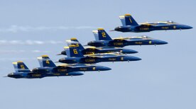 U.S. Navy Blue Angels put on a soaring performance over the Charleston Harbor in Charleston, S.C., April 17, 2010. The flying squadron's six demonstration pilots fly the F/A-18 Hornet, which are former fleet aircraft that are nearly combat ready. Significant modifications are made to each aircraft to make them performance jets versus fighters, but the modifications can be reversed to make the jets combat ready. With the outbreak of the Korean War in 1950, the Blue Angels and their jets ceased aerobatic demonstrations and formed the nucleus of Fighter Squadron 191, which served aboard the aircraft carrier USS Princeton. (U.S. Air Force Photo/Airman 1st Class Lauren Main)