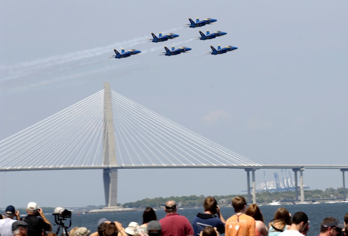 U.S. Navy Blue Angels put on a crowd pleasing performance over the Charleston Harbor in Charleston, S.C., during an air show April 17, 2010, during Charleston Navy Week. The show included formation flying and stunts performed by the highly trained pilots. Performing their first demonstration in 1946, the Blue Angels are the oldest flying aerobatic team. (U.S. Air Force Photo/Airman 1st Class Lauren Main)