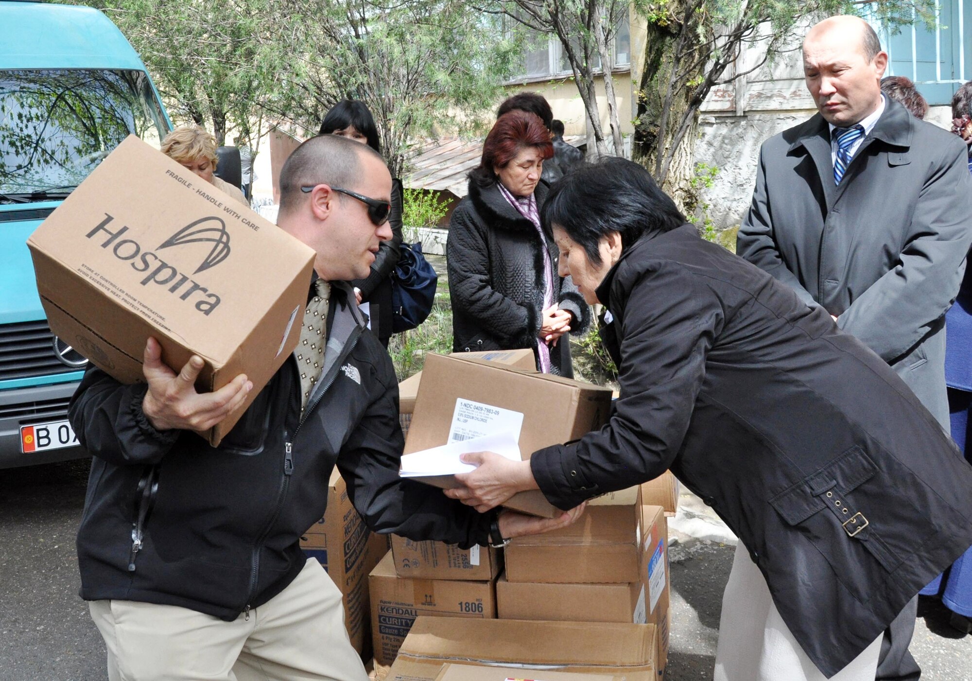 Jeff Villemarette carries medical supplies from the Transit Center at Manas April 15, 2010, to the National Hospital in Bishkek, Kyrgyzstan. (U.S. Air Force photo/Staff Sgt. Carolyn Viss)