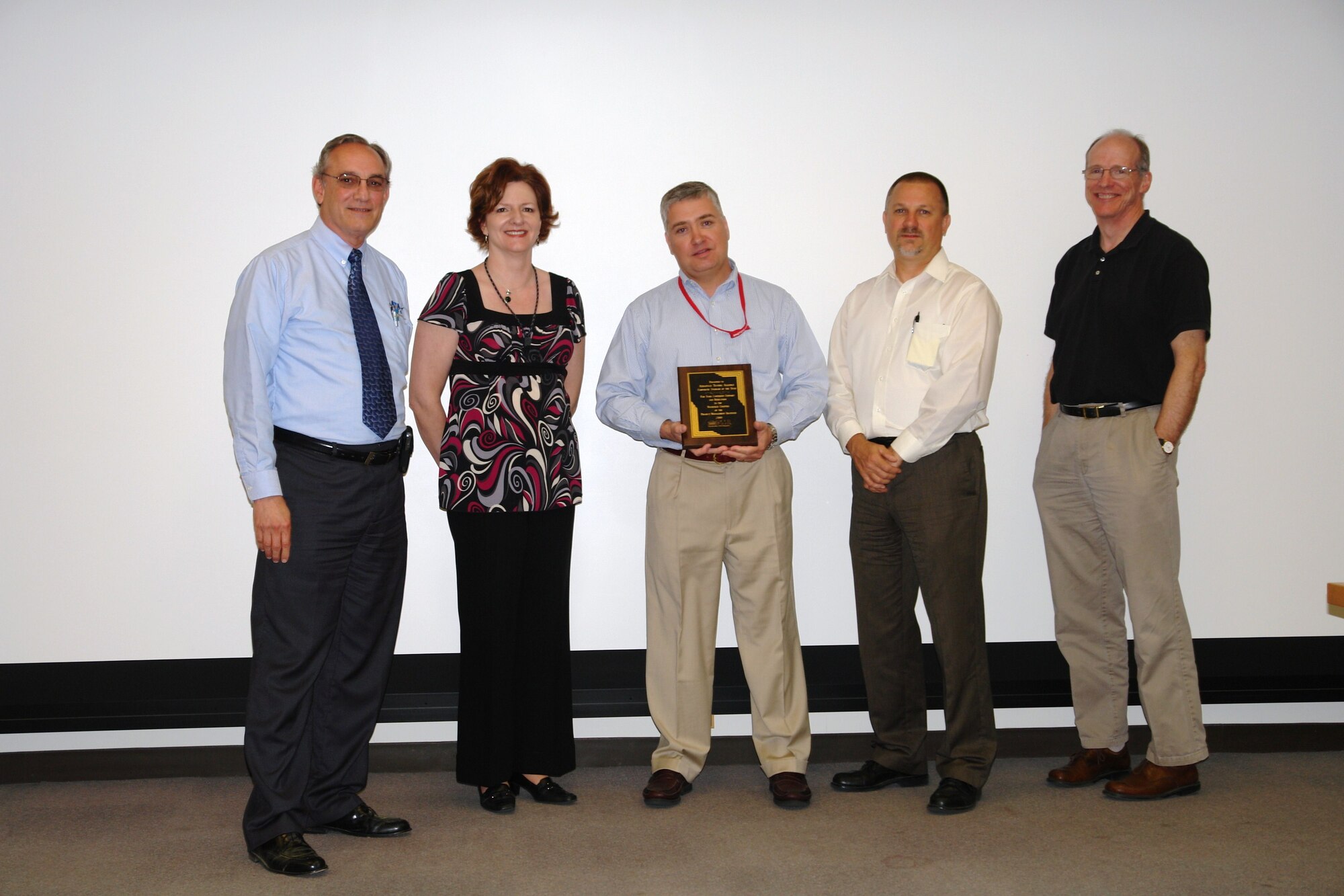 (L-R) Louis Vanacore, director, projects and design engineering; Sharon Carter, deputy director, projects and design engineering; JonPaul Wallace, ATA project manager; David Milleville, branch manager, Project Management; and Tim Campbell, deputy branch manager, Project Management, display the Corporate Sponsor of the Year Award from the Nashville PMI Chapter. (Photo by: Andrea Stephens)
