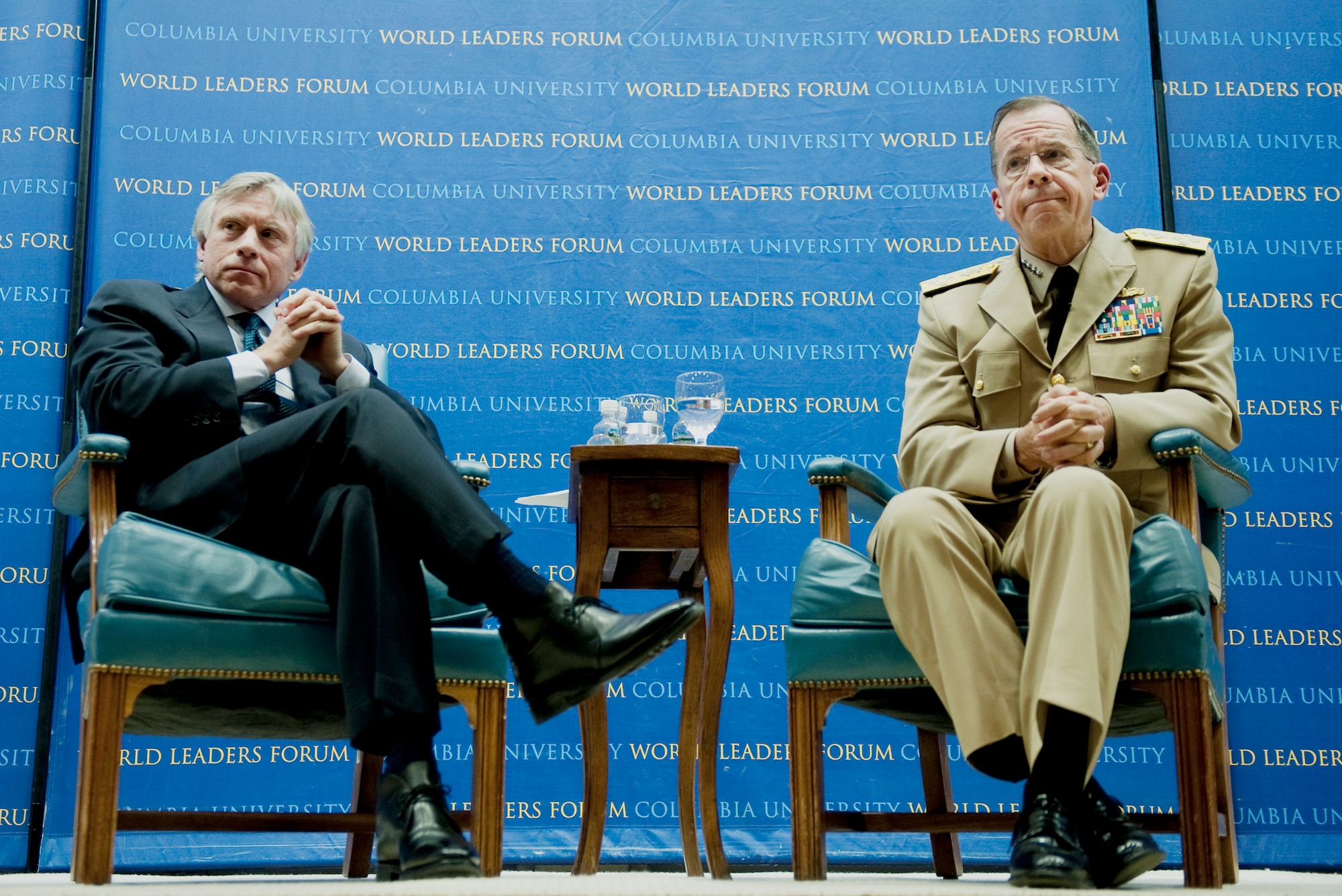 Lee C. Bollinger, president of Columbia University, and Adm. Mike Mullen, chairman of the Joint Chiefs of Staff, take questions at the Columbia University World Leaders Forum in New York City, April 18, 2010. (Defense Department photo/U.S. Navy Petty Officer Chad J. McNeeley)