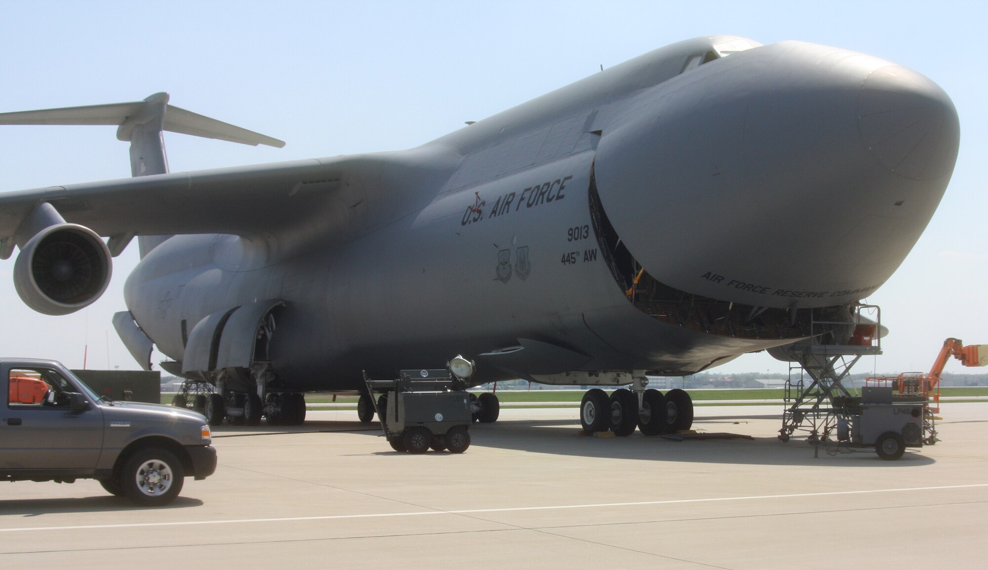 WRIGHT-PATTERSON AIR FORCE BASE, Ohio – A  445th Airlift Wing C-5 Galaxy receives repairs on the flightline on a warm spring day April 14. (U.S. Air Force photo/Staff Sgt. Amanda Duncan) 