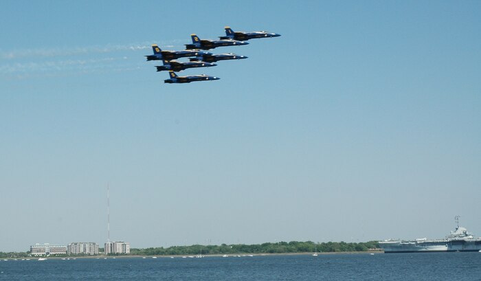 The Blue Angels soar over charleston harbor during thier practice run Friday, 12 April.  The Blue Angels performed on Saturday and Sunday for public viewing.