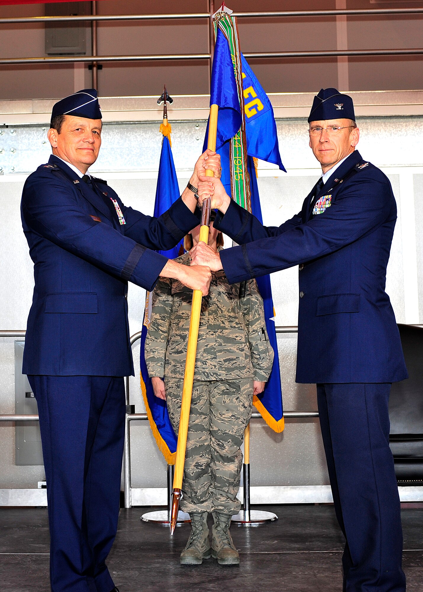 Col. Donald Lindberg (right) assumes command of the 44th Fighter Group from Maj. Gen. Frank Padilla, 10th Air Force commander, during an activation ceremony April 9, 2010, at Holloman Air Force Base, N.M.. The 44th FG is the only Air Force Reserve organization to be selected to fly and maintain the U.S. Air Force's premier air superiority fighter, the F-22 Raptor. (U.S. Air Force photo/Senior Airman DeAndre Curtiss)