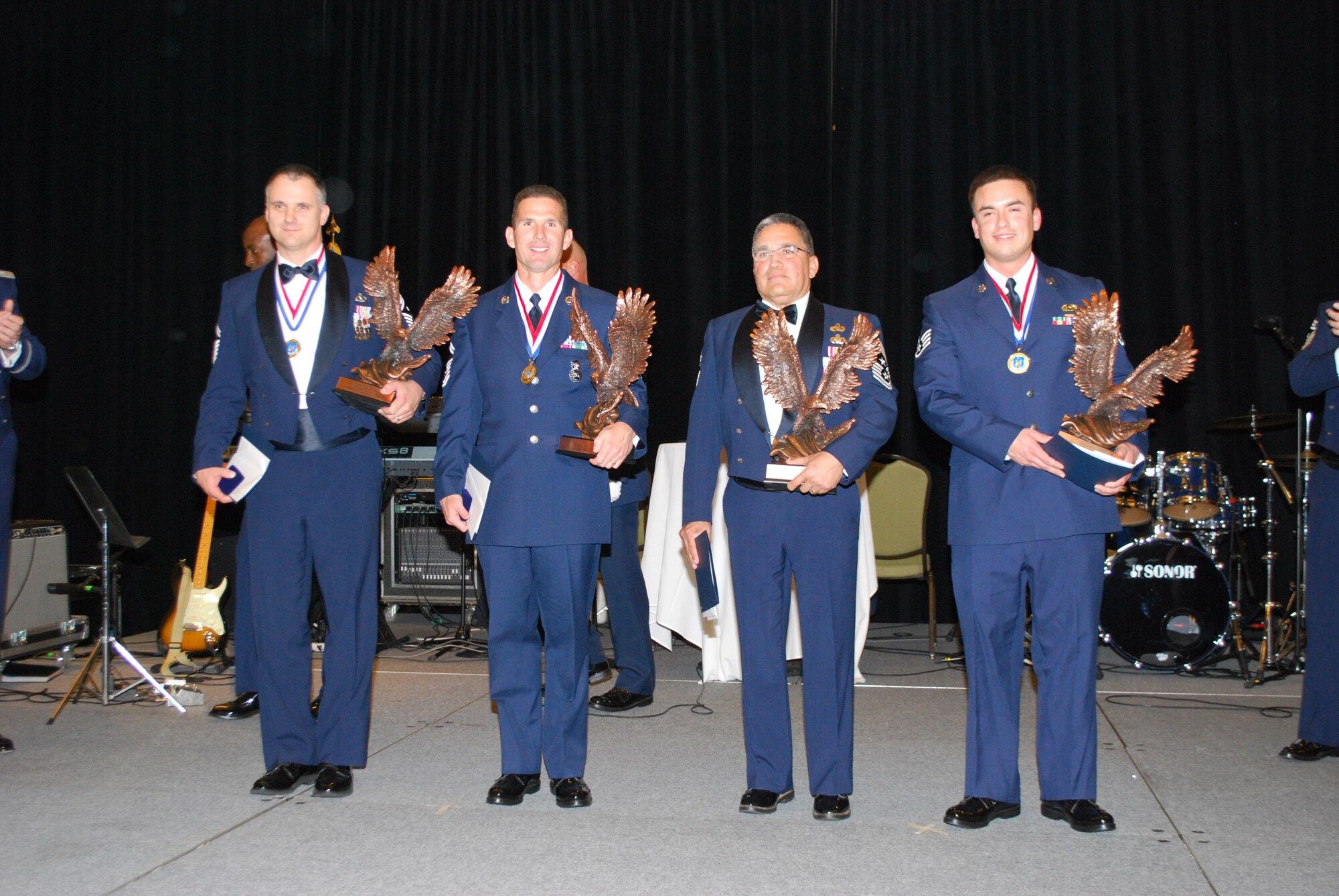 Air Force Reserve Command Outstanding Airmen of the Year winners are
honored at the AFRC 2009 OAY banquet April 14. (from l-r) Senior Master Sgt.
Mark Barber, AFRC First Sergeant of the Year; Senior Master Sgt. Steven West,
AFRC Senior Noncommissioned Officer of the Year; Command Chief Master Sgt.
Pablo Valverde, Jr.; Staff Sgt. James McKeown, AFRC Airman of the Year. Chief
Valverde, 944th Fighter Wing Command Chief Master Sgt. accepted the NCO of the
Year award on behalf of Technical Sgt. Stephen Hunter, Jr. who is currently
deployed.
