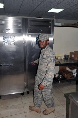 Senior Airman Levar Kinard, services journeyman with the 380th Expeditionary Force Support Squadron, works in Roy's flight kitchen in the operations area for the 380th Air Expeditionary Wing at a non-disclosed base in Southwest Asia on April 15, 2010. the 380th EFSS, as part of the 380th Air Expeditionary Wing, supports operations Iraqi Freedom and Enduring Freedom and the Combined Joint Task Force-Horn of Africa. Airman Kinard is deployed from the 108th Force Support Squadron at Joint Base McGuire-Dix-Lakehurst, N.J., and his hometown is Mount Holly, N.J. (U.S. Air Force Photo/Master Sgt. Scott T. Sturkol/Released)