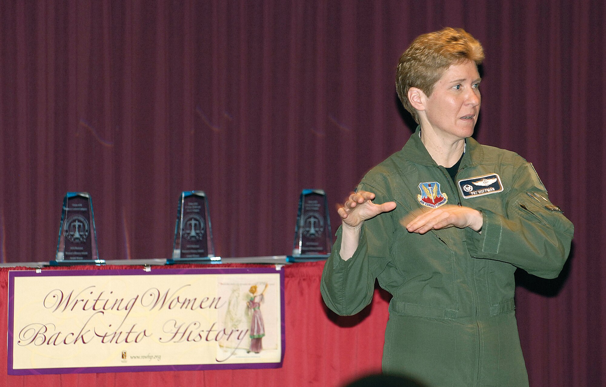 Col Patricia Hoffman, 552nd Air Control Wing commander, speaks at Tinker's Womens History Month Luncheon. (Air Force photo by Margo Wright)