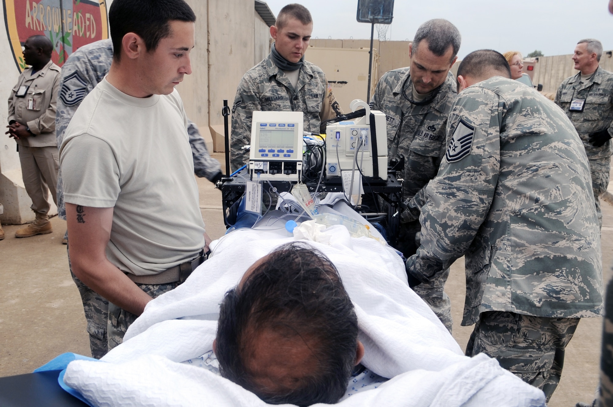 332nd Expeditionary Medical Group members secure a patient stretcher during an aeromedical evacuation mission April 17, 2010, at Joint Base Balad, Iraq. The 332nd EMDG is expecting about five aeromedical evacuation missions a week from Afghanistan, plus select in-system flights that will be flown as needed. (U.S. Air Force photo/Senior Airman Brittany Y. Bateman)