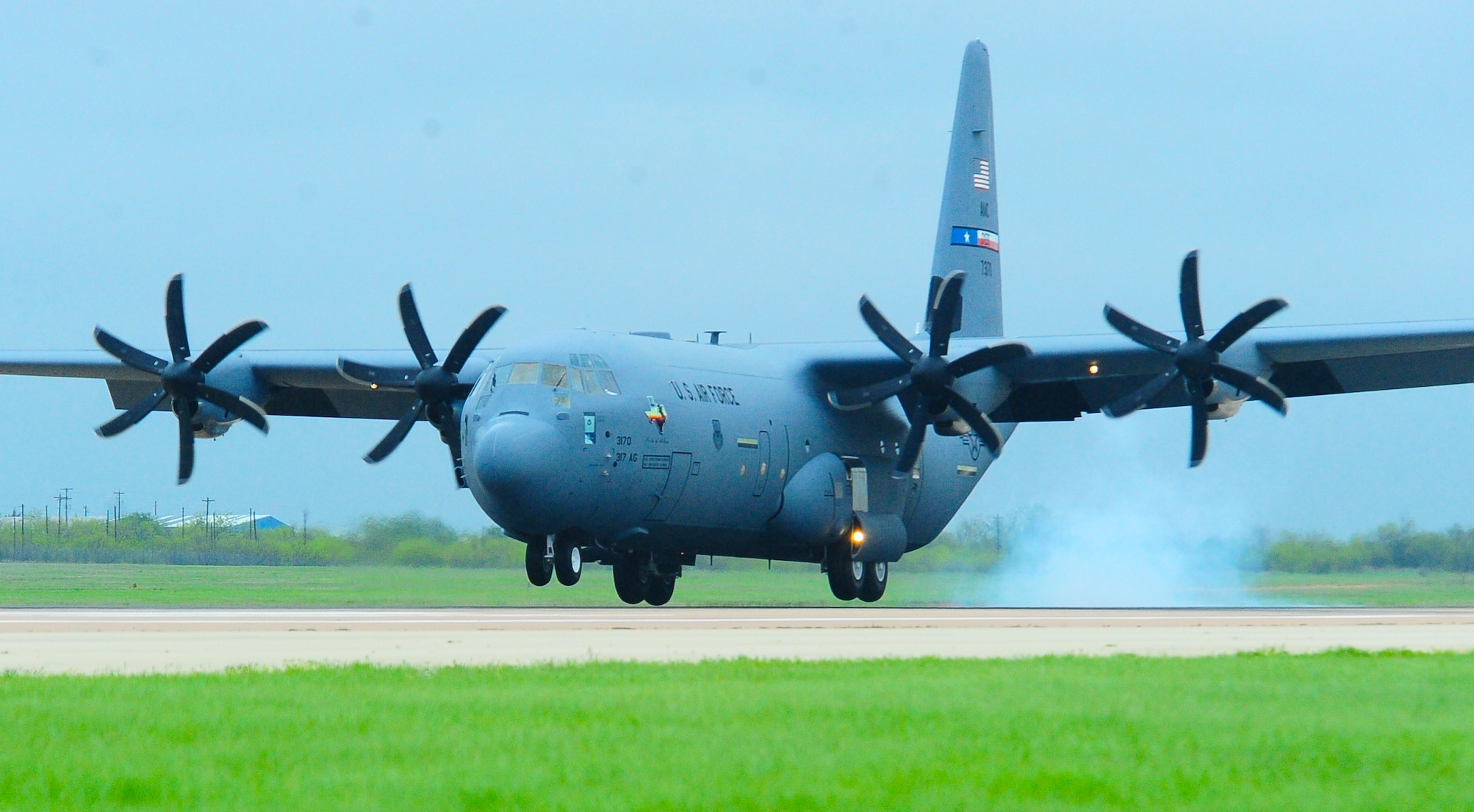 A C-130J Super Hercules touches down at Dyess Air Force Base, Texas, April 16, 2010.  The new Super Herc is being delivered by Air Force Chief of Staff Gen. Norton Schwartz to the 317th Airlift Group there. The base's first C-130J, named "The Pride of Abilene," is the first of 28 to be delivered by 2013 to replace the current aging fleet of C-130s. (U.S. Air Force photo/ Senior Airman Stephen Reyes)