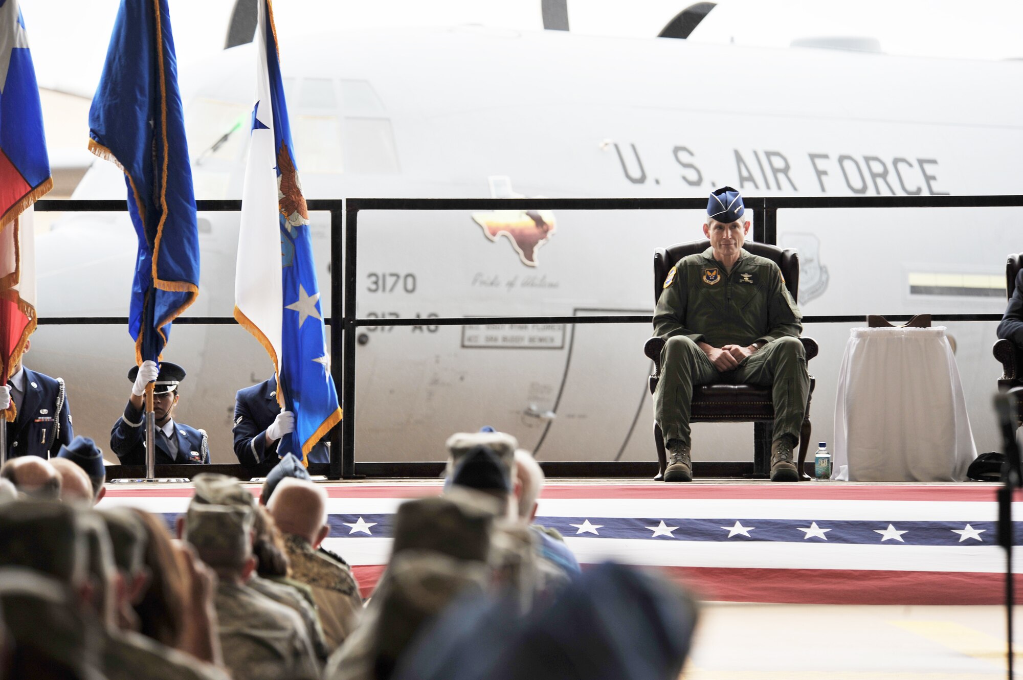 Air Force Chief of Staff Gen. Norton Schwartz waits to be introduced during a brief press conference at Dyess Air Force Base, Texas, April 16, 2010, following his delivery of a new C-130J Super Hercules to the base. This was the first of 28 C-130Js to be delivered to the 317th Airlift Group there. (U.S. Air Force photo/Staff Sgt. Desiree Palacios) 