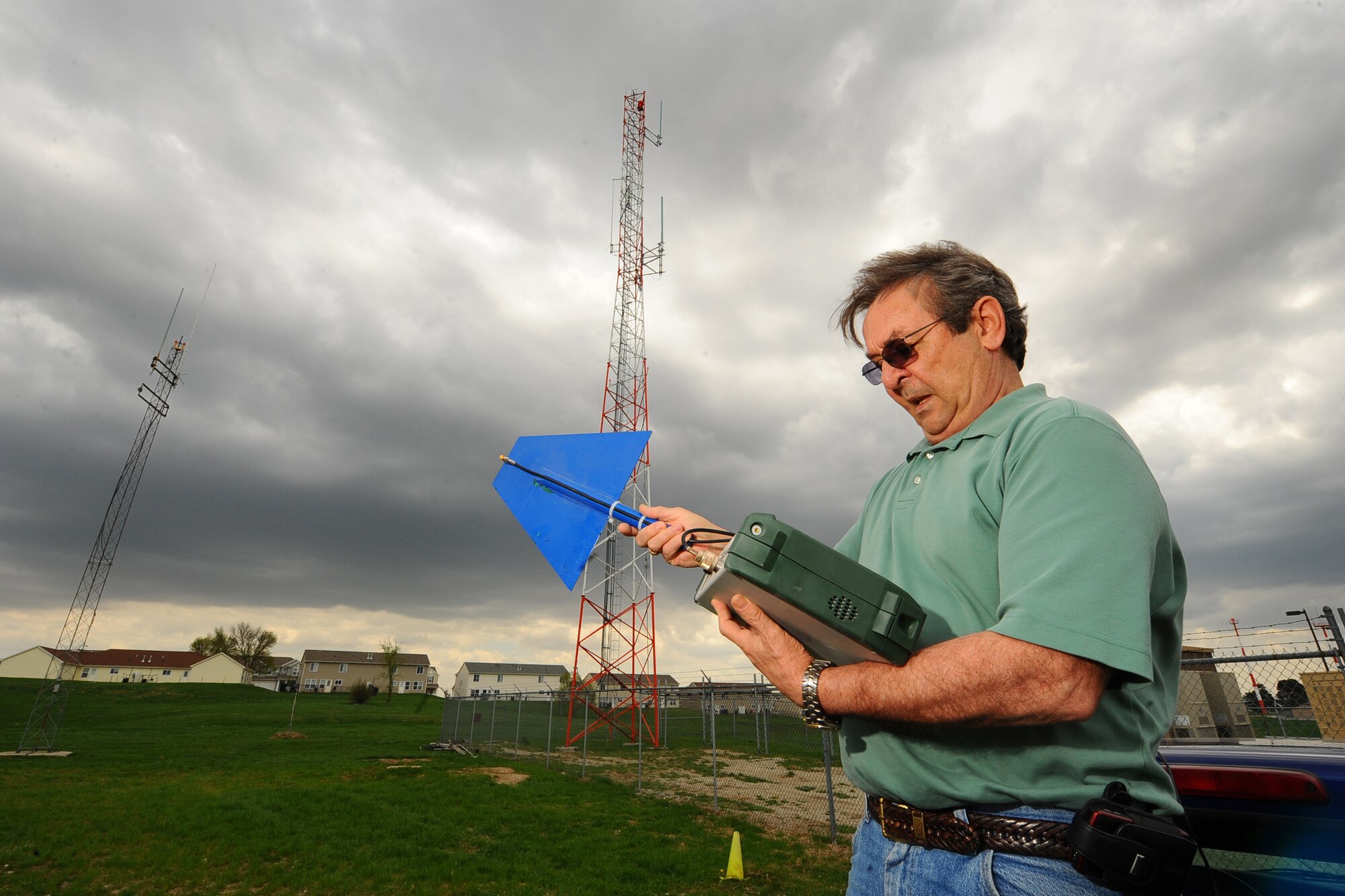 OFFUTT AIR FORCE BASE, Neb. - Ken Lemke, the Instillation Spectrum Manager with the 55th Communications Squadron, uses a spectrum analyzer to pinpoint the exact location of a frequency interruption here April 15. Rogue radio frequencies can momentarily cross with Offutt's radio waves which is common. Mr. Lemke uses various tools, like the spectrum analyzer, to pinpoint the exact location of such disturbances and remove them through various means. Mr. Lemke was recently announced as the Communications and Information career field's Outstanding ISM award winner for 2009. U.S. Air Force Photo by Josh Plueger
  