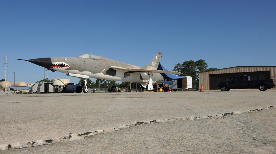 MOODY AIR FORCE BASE, Ga. -- A team from Air Force Radiological Recycling and Disposal as well as the National Museum of the United States Air Force work together to remove panels containing low level presence of radioactive energy from an F-105 Thunderchief static aircraft here April 14. The team worked for four days to remove all the panels to ensure the aircraft is ready for display at Moody’s future Heritage Park. (U.S. Air Force photo by Airman 1st Class Benjamin Wiseman/RELEASED)
