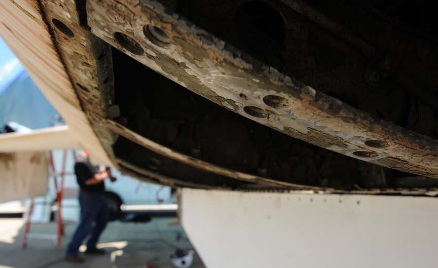MOODY AIR FORCE BASE, Ga. -- The belly panels of an F-105 Thunderchief are removed due to a low-level presence of radioactive energy in the metal alloy. The new belly panels will be made from fiberglass. (U.S. Air Force photo by Airman 1st Class Benjamin Wiseman/RELEASED)

