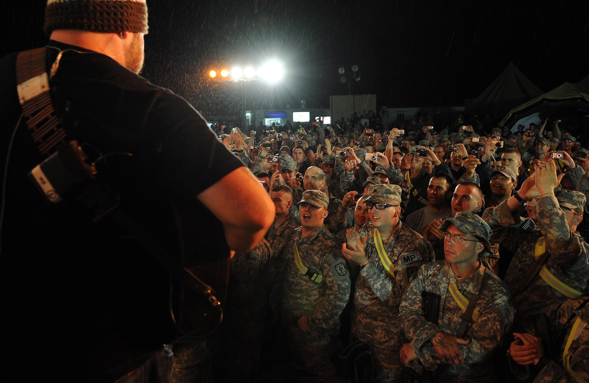 The Zac Brown Band brings a little piece of "down home" to the Airmen and
Soldiers stationed at Kirkuk Regional Air Base during their performance on
April 17, 2009.  The KRAB was just one of several visits the band made
during their week-long tour to Iraq. The band opted to spend time with
deployed troops rather than attend the Academy of Country Music Awards
happening this week in Las Vegas. They were up for three awards.  (U.S. Air
Force photo/Staff Sgt. Tabitha Kuykendall/Released)
