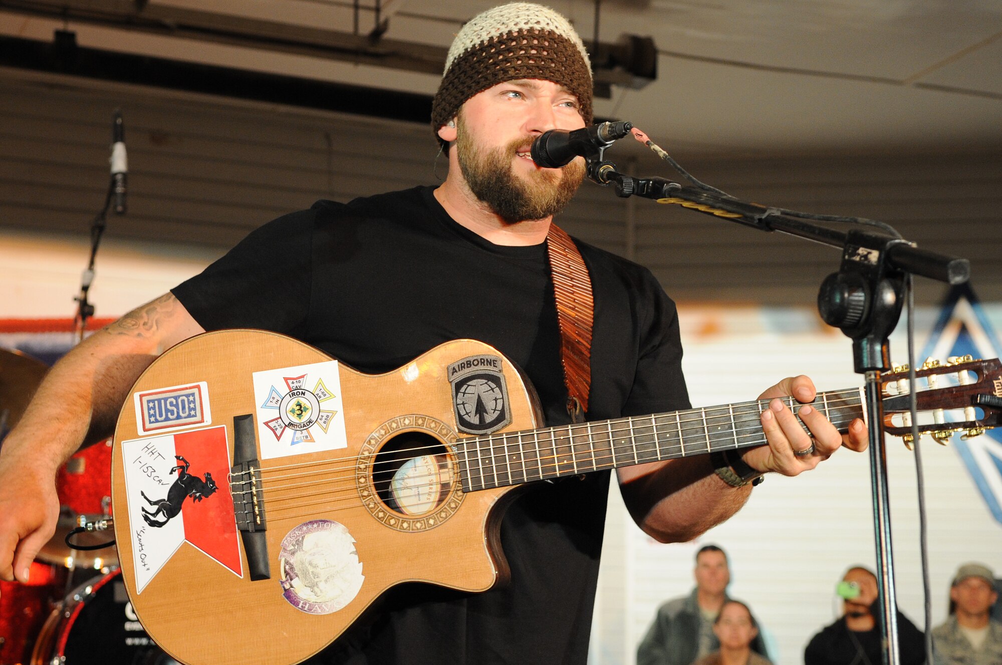 The Zac Brown Band brings a little piece of "down home" to the Airmen and
Soldiers stationed at Kirkuk Regional Air Base during their performance on
April 17, 2009.  The KRAB was just one of several visits the band made
during their week-long tour to Iraq. The band opted to spend time with
deployed troops rather than attend the Academy of Country Music Awards
happening this week in Las Vegas. They were up for three awards.  (U.S. Air
Force photo/Staff Sgt. Tabitha Kuykendall/Released)

