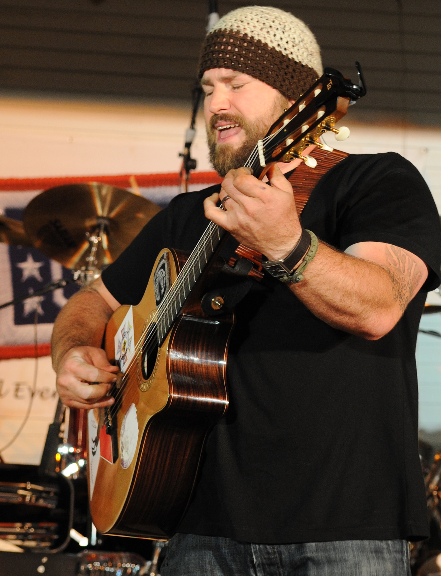 The Zac Brown Band brings a little piece of "down home" to the Airmen and
Soldiers stationed at Kirkuk Regional Air Base during their performance on
April 17, 2009.  The KRAB was just one of several visits the band made
during their week-long tour to Iraq. The band opted to spend time with
deployed troops rather than attend the Academy of Country Music Awards
happening this week in Las Vegas. They were up for three awards.  (U.S. Air
Force photo/Staff Sgt. Tabitha Kuykendall/Released)

