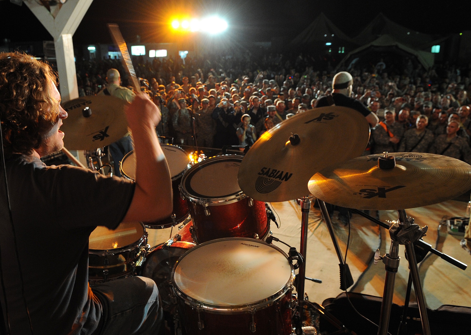 The Zac Brown Band brings a little piece of "down home" to the Airmen and
Soldiers stationed at Kirkuk Regional Air Base during their performance on
April 17, 2009.  The KRAB was just one of several visits the band made
during their week-long tour to Iraq. The band opted to spend time with
deployed troops rather than attend the Academy of Country Music Awards
happening this week in Las Vegas. They were up for three awards.  (U.S. Air
Force photo/Staff Sgt. Tabitha Kuykendall/Released)
