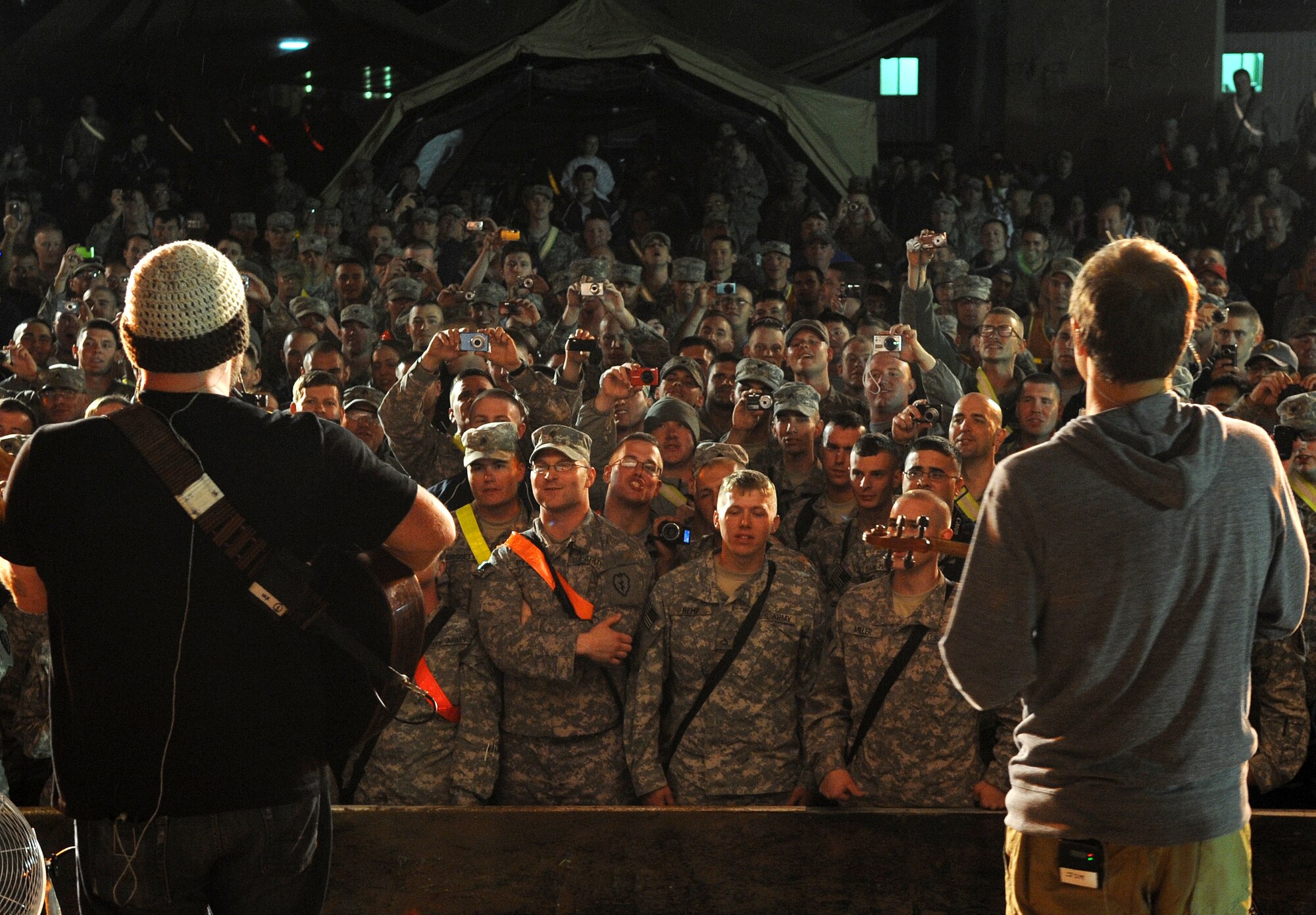 The Zac Brown Band brings a little piece of "down home" to the Airmen and
Soldiers stationed at Kirkuk Regional Air Base during their performance on
April 17, 2009.  The KRAB was just one of several visits the band made
during their week-long tour to Iraq. The band opted to spend time with
deployed troops rather than attend the Academy of Country Music Awards
happening this week in Las Vegas. They were up for three awards.  (U.S. Air
Force photo/Staff Sgt. Tabitha Kuykendall/Released)
