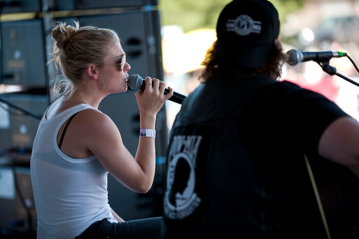 NELLIS AIR FORCE BASE, Nev. --   Singers, Randy Houser and LeAnn Rimes perform onstage during the Academy of Country Music's USO concert at Nellis Air Force Base April 17, 2010. (U.S. Air Force photo by Tech. Sgt. Michael R. Holzworth)