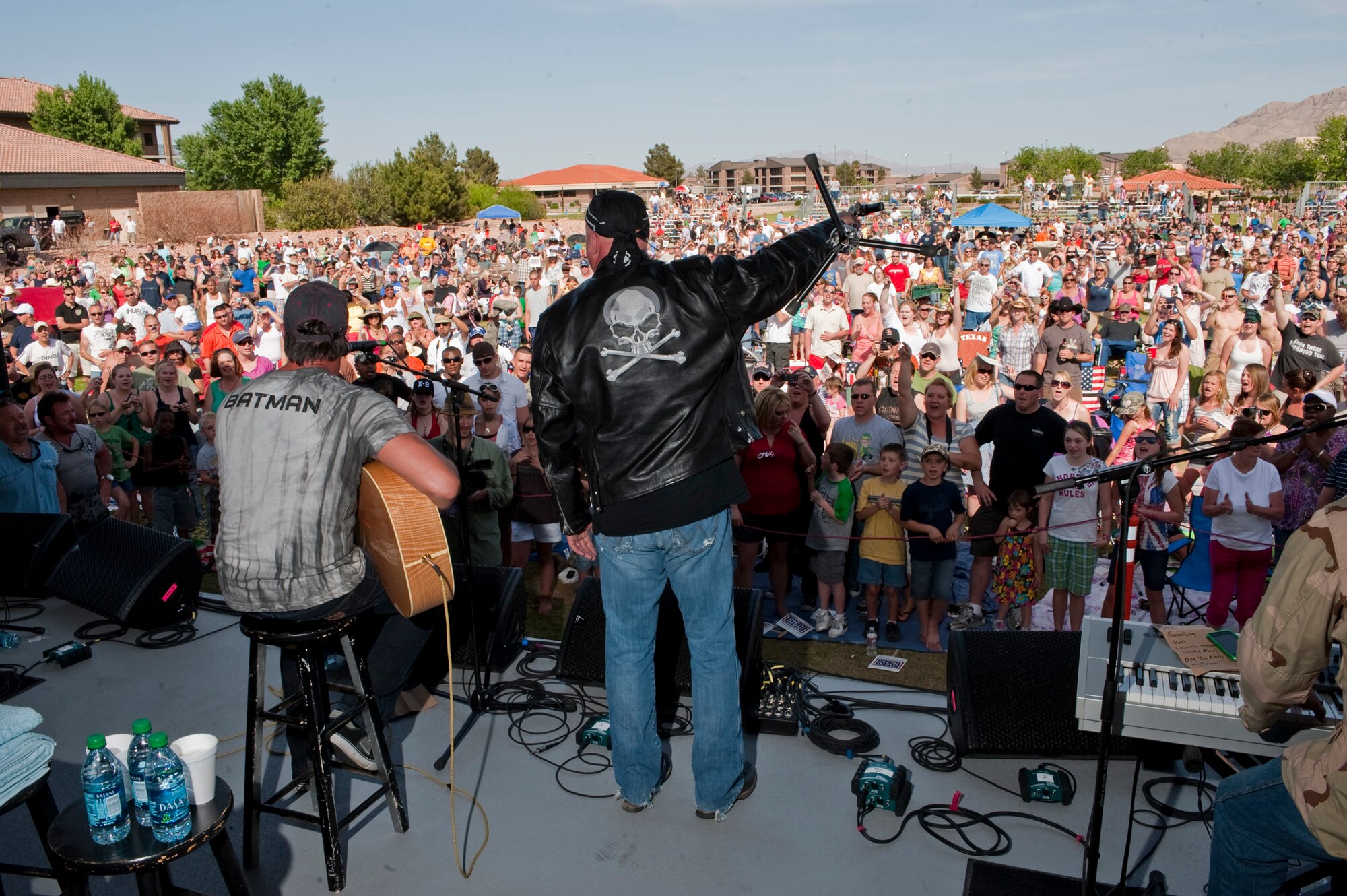 NELLIS AIR FORCE BASE, Nev. --   Montgomery Gentry perform to a packed crowd at the Nellis Sports Pavilion Saturday, April 17, 2010. Montgomery Gentry headlined the free concert hosted by the Academy of Country Music's charitable arm "Lifting Lives" and the USO. (U.S. Air Force photo by Tech. Sgt. Michael R. Holzworth)
