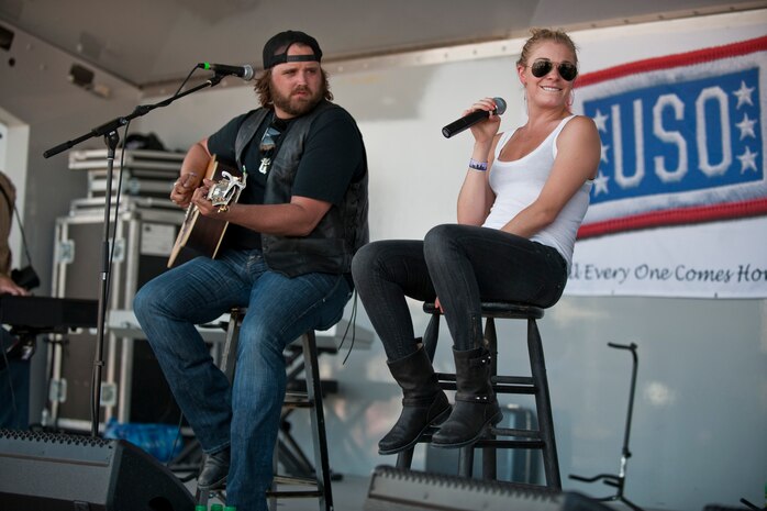 NELLIS AIR FORCE BASE, Nev. --   Singers, Randy Houser and LeAnn Rimes perform onstage during the Academy of Country Music's USO concert at Nellis Air Force Base April 17, 2010. (U.S. Air Force photo by Tech. Sgt. Michael R. Holzworth)
