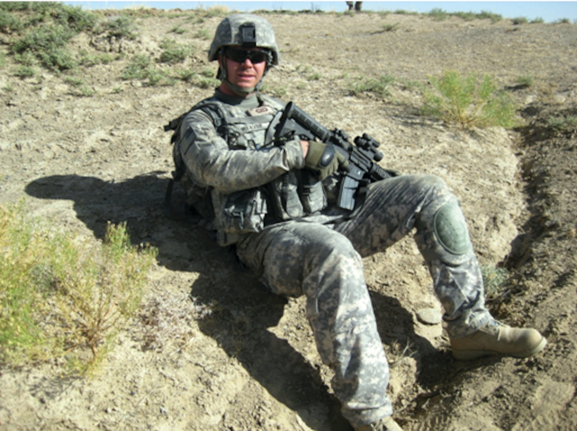 Staff Sgt. Justin Weaver, 31st Fighter Wing Public Affairs journeyman, poses for a photo during his deployment in 2009. Sergeant Weaver recently received the Airman 1st Class Darryl Winters Award for the 2009 Air Force Public Affairs Award for Communication Excellence. (Courtesy photo)