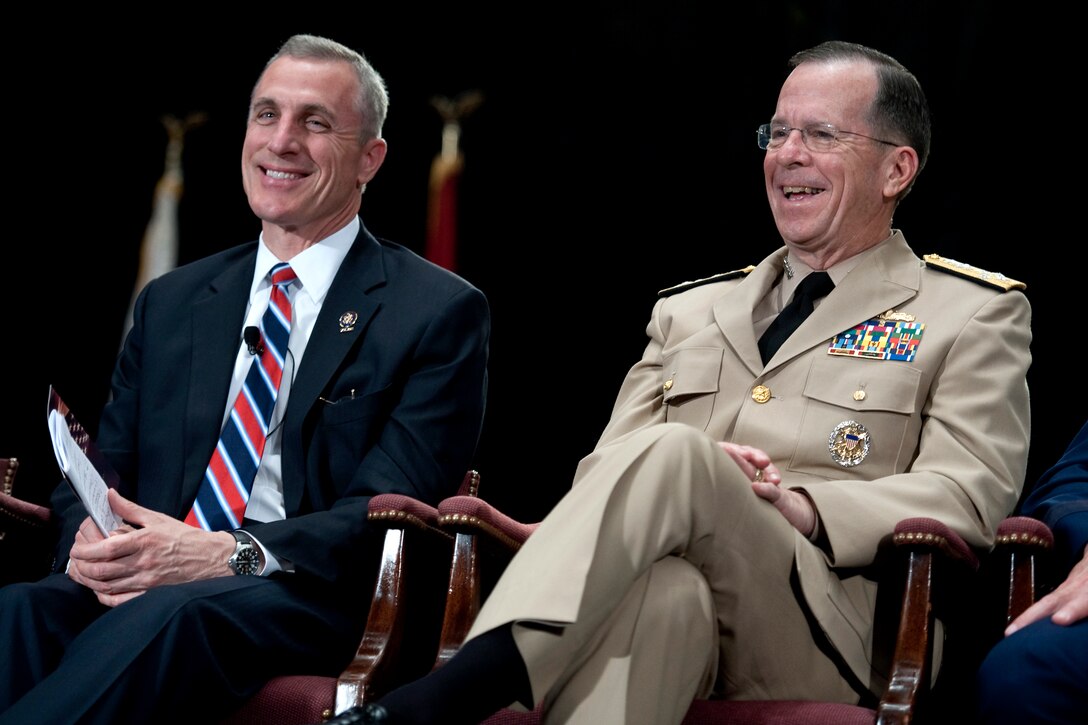 Rep. Tim Murphy of Pennslyvania and Navy Adm. Mike Mullen, chairman of the Joint Chiefs of Staff, participate in a town hall forum at Soldiers and Sailors Memorial Hall and Museum at the University of Pittsburgh, April 19, 2010. 