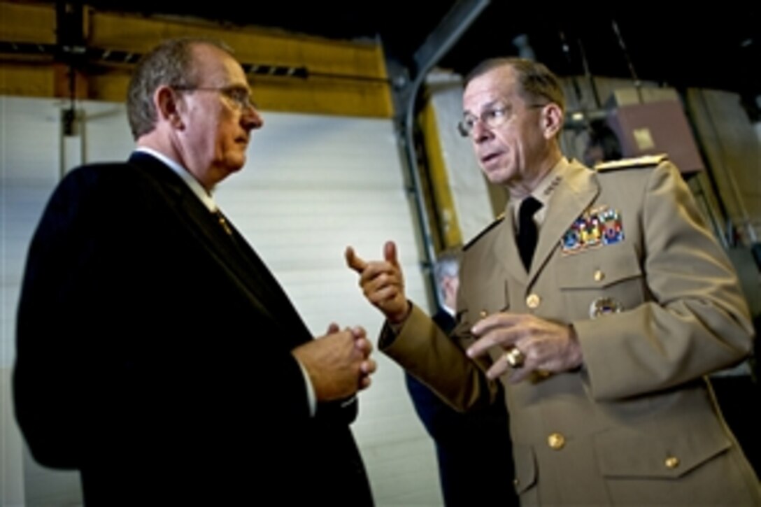 U.S. Navy Adm. Mike Mullen, chairman of the Joint Chiefs of Staff, speaks with Albert H. Mercer, executive director, Veterans Leadership Program of Western Pennsylvania, in Pittsburgh, April 19, 2010. The program provides essential housing, employment and other vital supportive services to eligible veterans, troops and their families to improve self-sufficiency, sustainability and quality of life.