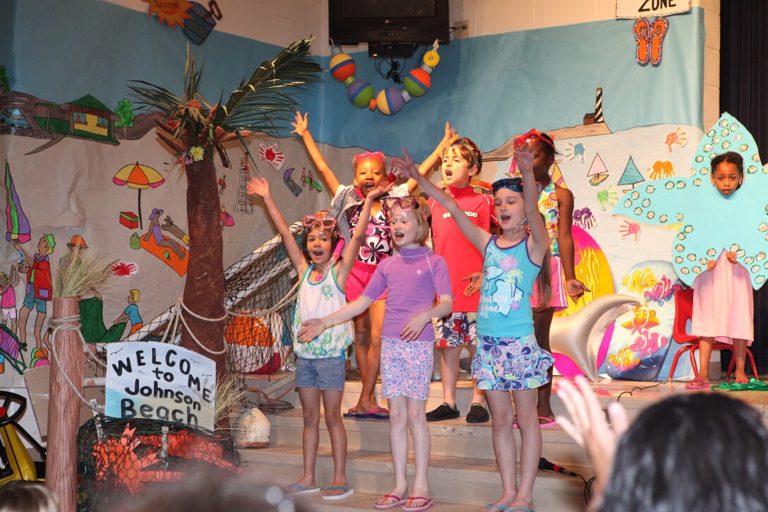 Children at Johnson Primary School aboard Marine Corps Base Camp Lejeune sing a song during their spring musical, “Oceans of Fun,” April 20.  The kindergarten, 1st grade and 2nd grade students learned about ocean animals and their habitats in celebration of Earth Day and Month of the Military Child.