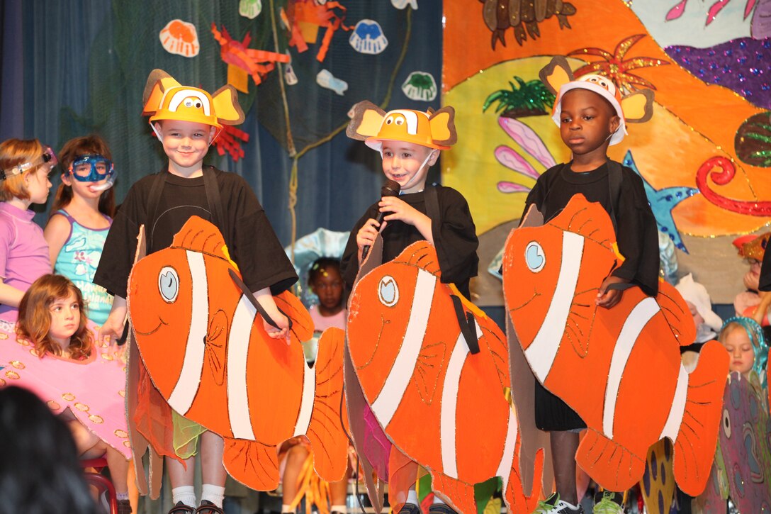 Children at Johnson Primary School aboard Marine Corps Base Camp Lejeune talk about clown fish during their spring musical, “Oceans of Fun,” April 20.  The kindergarten, 1st grade and 2nd grade students learned about ocean animals and their habitats in celebration of Earth Day and Month of the Military Child.