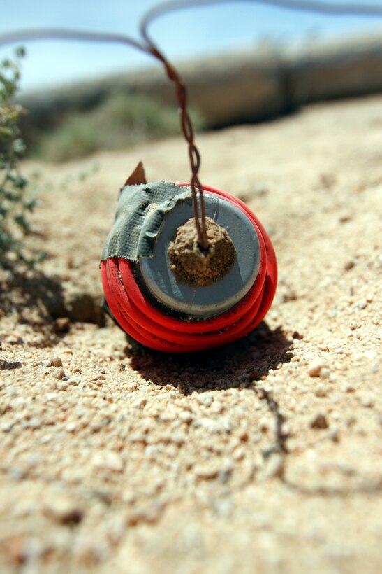 MARINE CORPS AIR GROUND COMBAT CENTER TWENTYNINE PALMS, Calif. - Instructors at the Combat Center's newest range teach Marines such skills as detecting hidden improvised explosive devices, like the wired up mortar round shown here. The new range is Combat Center Range 800, made for tenant units preparing for deployments to Afghanistan.