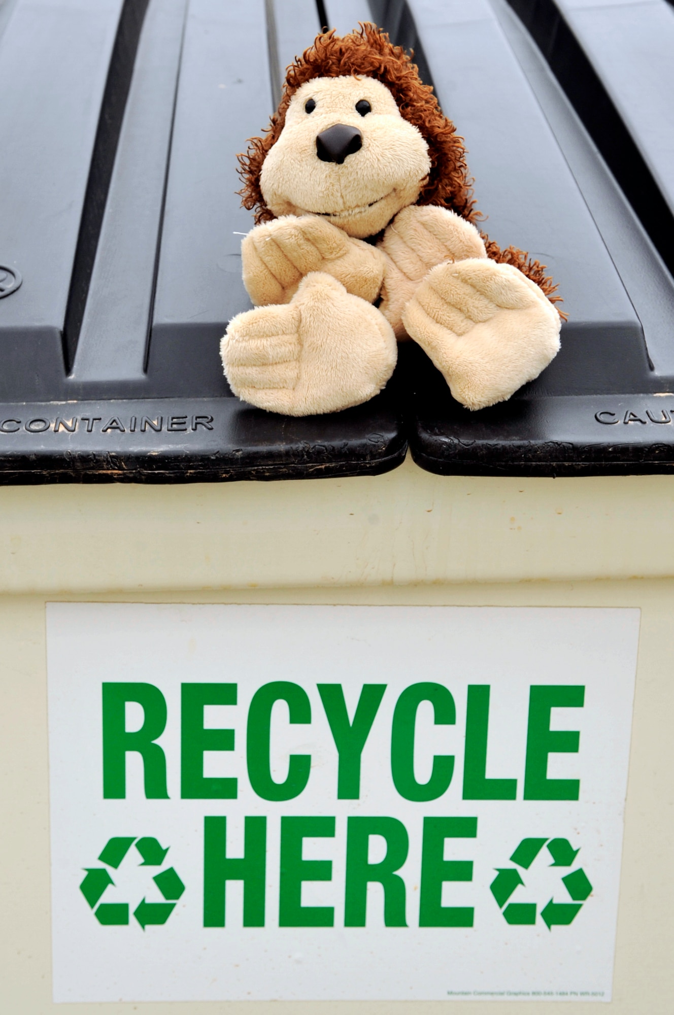 BUCKLEY AIR FORCE BASE, Colo. -- Recycling reduces pollution emissions caused by the manufacturing of new materials. Remember, saving the Earth is easy. It's so easy a monkey can do it.  (U.S. Air Force photo by Staff Sgt. Kathrine McDowell)