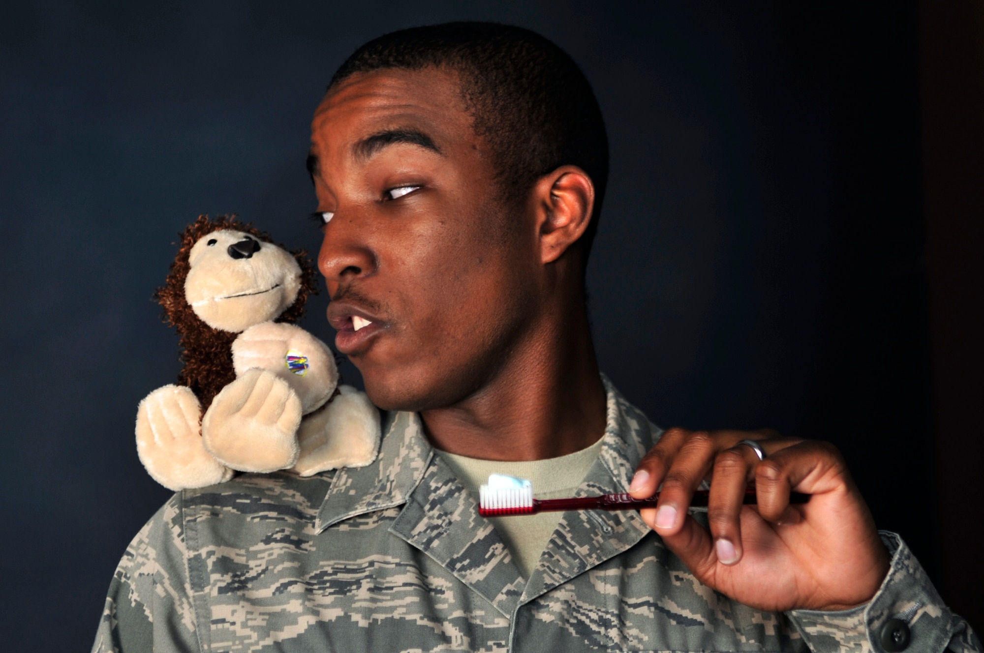 BUCKLEY AIR FORCE BASE, Colo. -- In the spirit of Earth Day April 22, Team Buckley has chosen a "Top 10" list of things to do to decrease our carbon footprint. Turn off the water when brushing your teeth. This will save eight gallons of water a day. Remember, saving the Earth is easy. It's so easy a monkey can do it.  (U.S. Air Force photo by Staff Sgt. Kathrine McDowell)