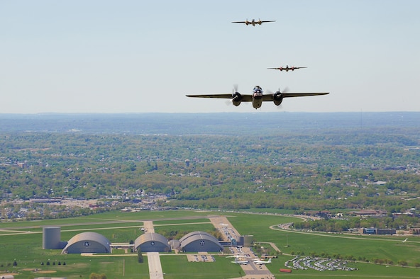 DAYTON, Ohio -- Vintage B-25 Mitchell bombers fly over the National Museum of the U.S. Air Force during a memorial flight honoring the Doolittle Tokyo Raiders on April 18, 2010. This year plans call for 17 B-25 bombers to take part in a two-day tribute commemorating the 75th Anniversary of the Doolittle Tokyo Raid (weather dependent). (U.S. Air Force photo/Tech. Sgt. Jacob N. Bailey)


