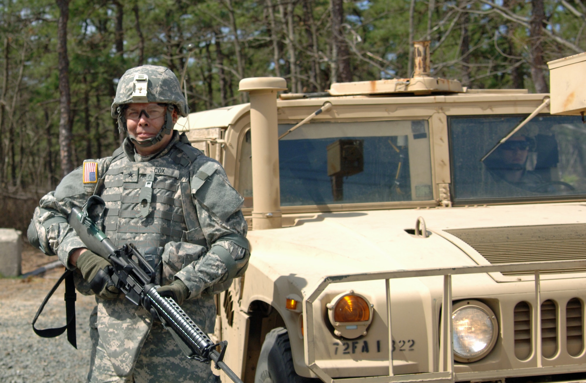 Rear Admiral Samuel Cox, from Hoffman Estates, Ill., undergoes exercises at training sites Liberty and Macasa, with Army Support Activity-Dix, here April 7. Cox is assigned to a joint staff special venture, the Afghanistan-Pakistan Hands Program. Cox has undergone several months of language training and is preparing for an upcoming deployment to Afghanistan. (U.S. Army photo/Valerie Tandoi)