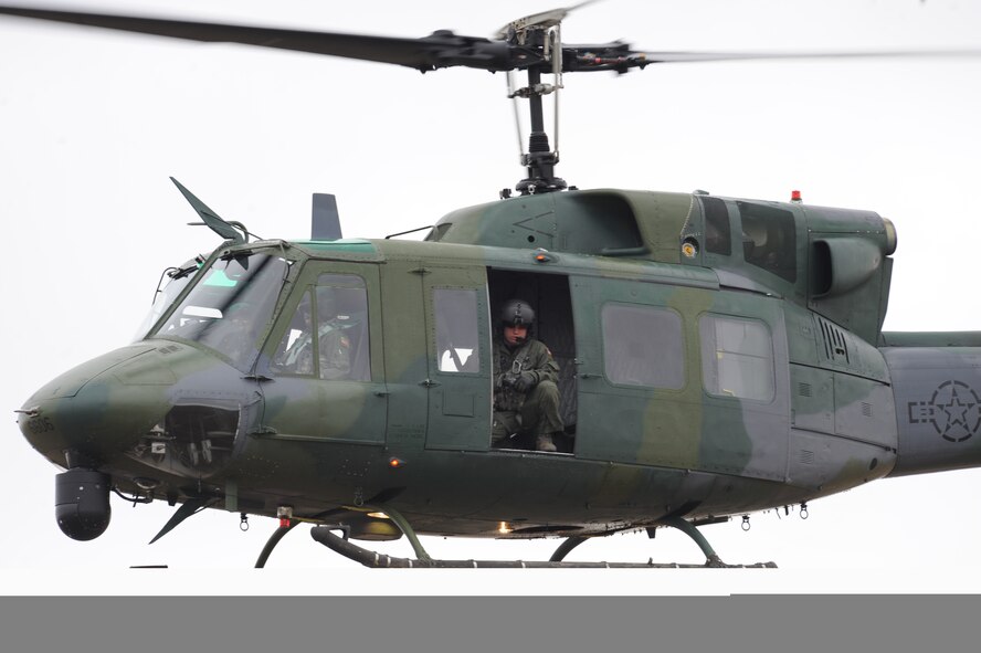 NEAR PARSHALL, N.D. – A UH-1N helicopter from the 54th Helicopter Squadron patrols the skies above the H-08 Minuteman III launch facility near Parshall, N.D., April 15. The helicopter was part of coordinated actions from the 91st Missile Wing and the 5th Bomb Wing after Security Forces determined a man had crawled over the fence of the LF as a sign of protest. (U.S. Air Force photo by Staff Sgt. Keith Ballard)