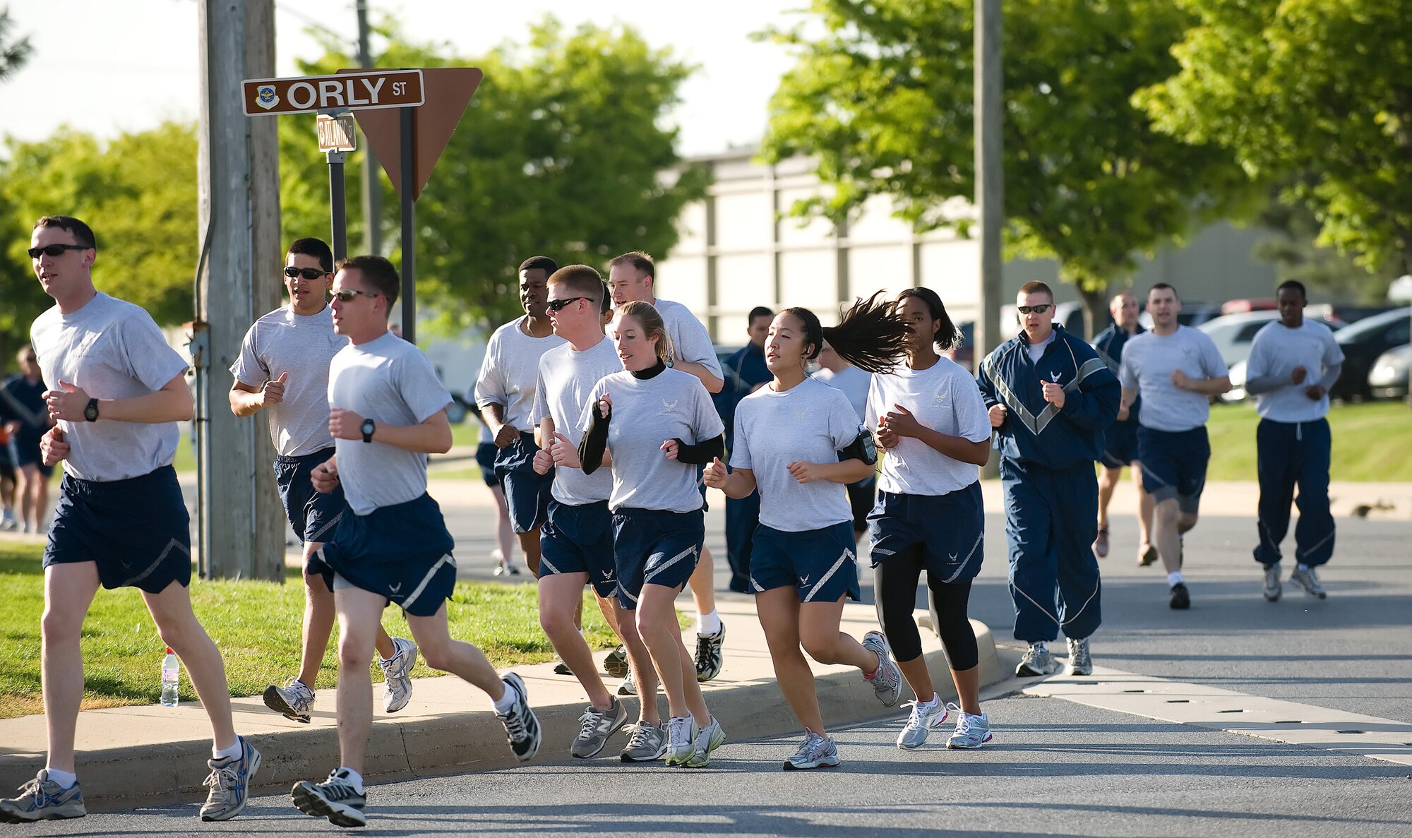 Team Dover members run on base in the five kilometer Warrior Run April 20. (U.S. Air Force photo/ Jason Minto)