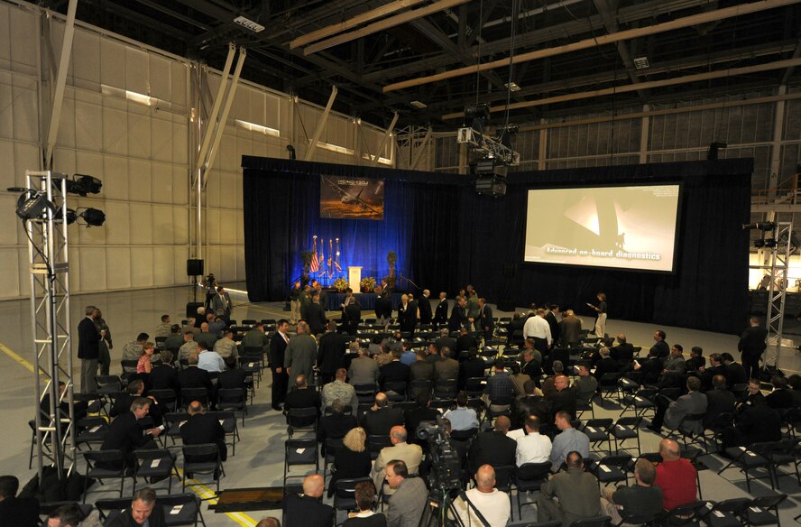 MARIETTA, Ga. -- Invited guests and workers from the Lockheed Martin Aeronautics Company gather together before the unveiling of the first HC-130J Super Hercules aircraft here April 19. There were nearly 300 invited guests, including LMAC team members and military personnel that played an important role in the development of the new aircraft. (U.S. Air Force photo by Airman 1st Class Benjamin Wiseman/RELEASED)