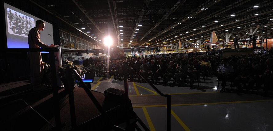 MARIETTA, Ga. -- Maj. Aaron Griffith, 71st Rescue Squadron assistant director of operations, gives a real-world scenario to the crowd here April 19. Major Griffith explained that the new HC-130J Super Hercules aircraft allows for shorter response time for rescue personnel, which equals lives saved. (U.S. Air Force photo by Airman 1st Class Benjamin Wiseman/RELEASED) 