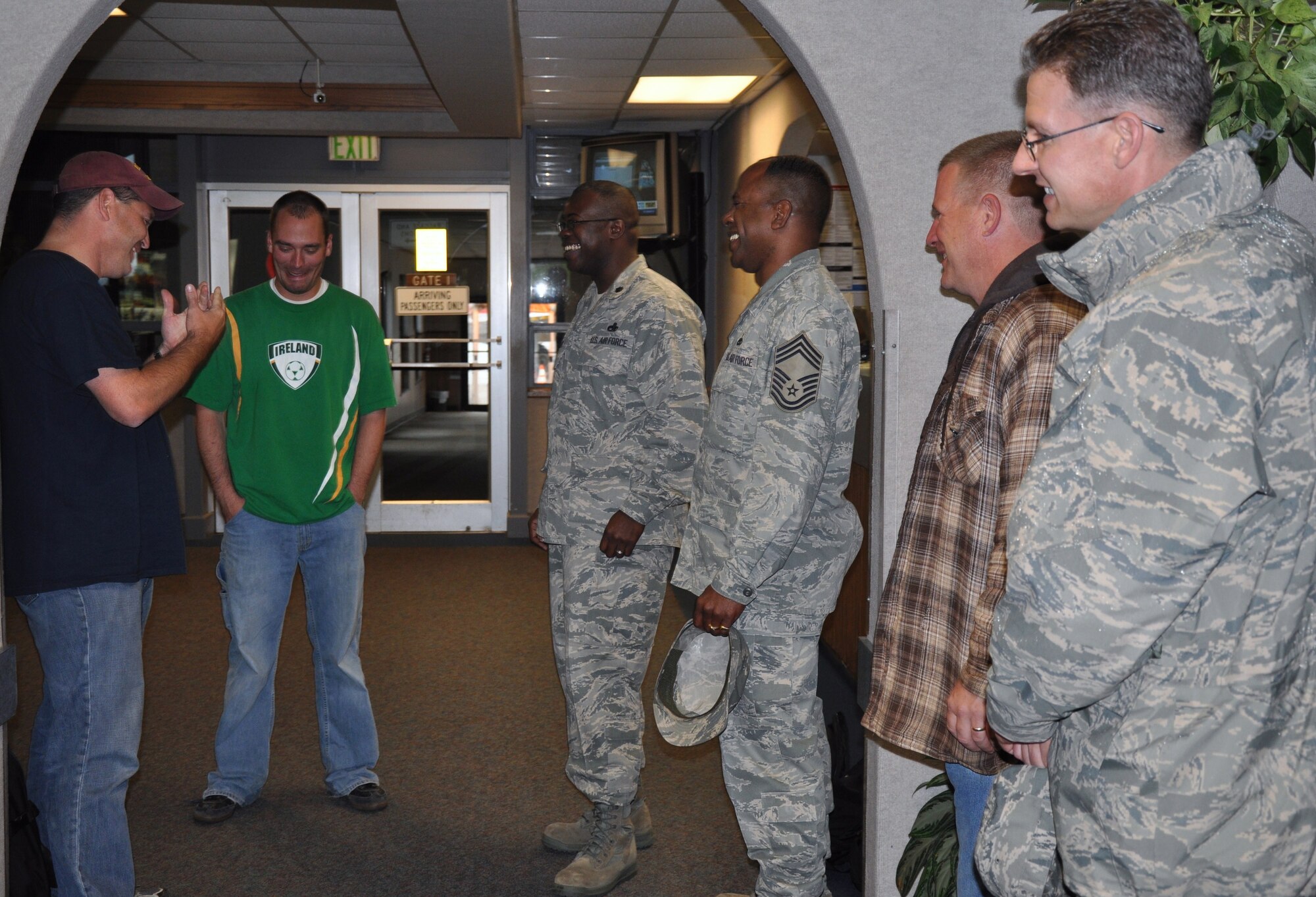 Master Sgt. Anthony Amborn, 373rd Training Squadron Detachment 10 chief (black shirt), and Staff Sgt. Stephen Ondrovich, 373rd TRS KC-135 Communications and Navigations Course instructor (green shirt), both from Grand Forks Air Force Base, N.D., share stories about their experiences  in Chile after returning to Sheppard, April 17. The two Sergeants assisted in relief efforts in the Concepción, Chile, after an 8.8-magnitude earthquake hit Chile Feb. 27. (U.S. Air Force Photo/Airman 1st Class Adawn Kelsey)